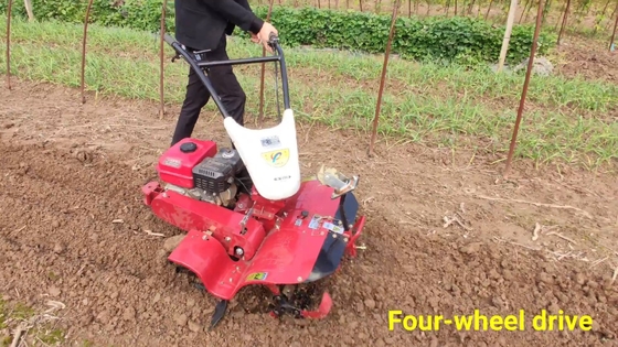 Tiller de manejo de huertos de cuatro ruedas motrices con empuje manual y transmisión de cinta