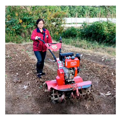 Velocidad de trabajo 4KM/H Inicio manual cultivador manual para trabajo agrícola y jardinero conveniente