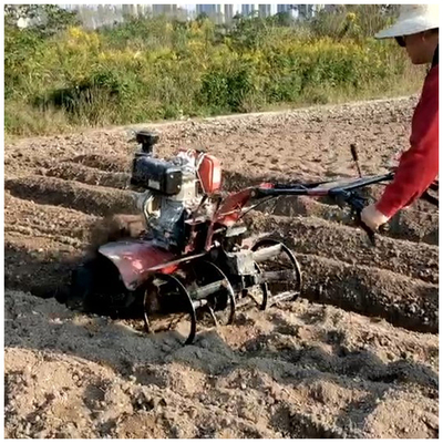 Tiller eléctrico de gasolina con tracción en las cuatro ruedas para un funcionamiento ahorrador de mano de obra