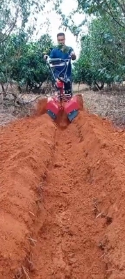177F Motor de gasolina con tracción a las cuatro ruedas Mini Power Tiller Cultivator para granja y jardín