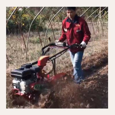 177F Motor de gasolina con tracción a las cuatro ruedas Mini Power Tiller Cultivator para granja y jardín