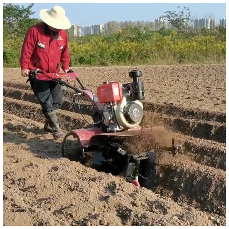 Tiller eléctrico de gasolina con tracción en las cuatro ruedas para un funcionamiento ahorrador de mano de obra